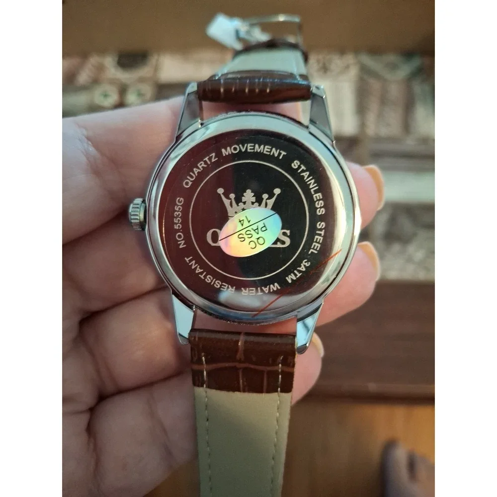 NIB OLEVS 5535G Mens Watch,Quartz Movement, Day/date, Brown Leather Band.